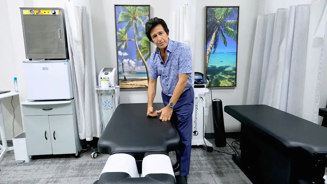 Dr. Ivan Bracic, DC providing chiropractic manual therapy at Novar&eacute; Injury Care in Fort Myers