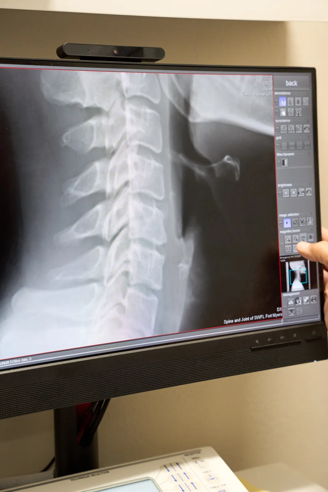 Dr. Ivan performing chiropractic evaluation at Novaré Injury Care